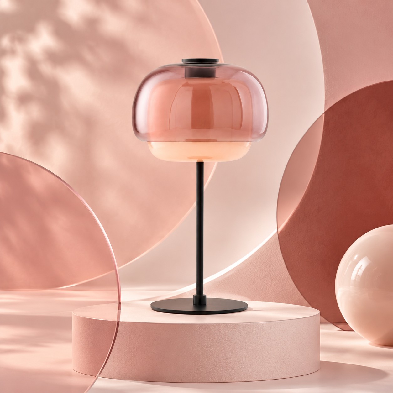 Blush double-dome glass table lamp on a pink art set